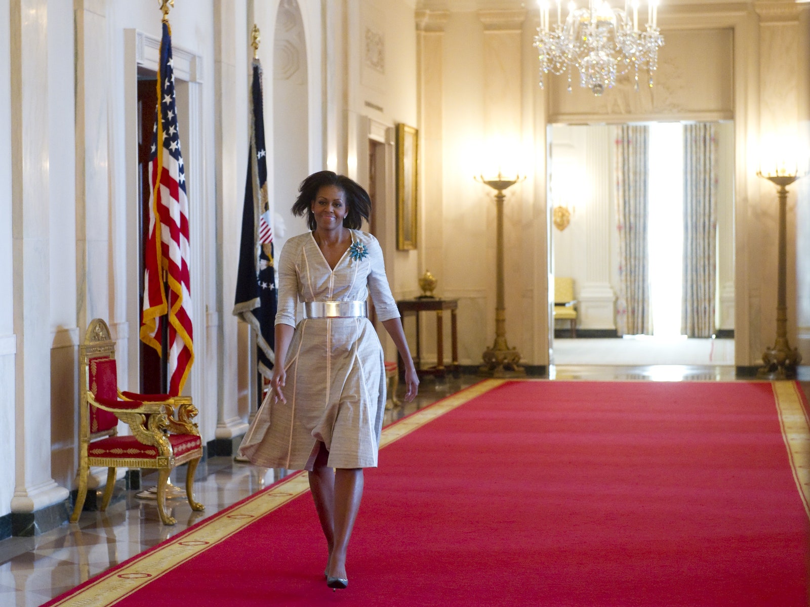 Michelle Obama walking through White House